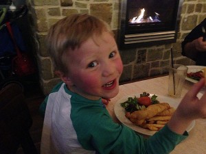 Lachlan enjoys the kids traditional fish and chips, $10