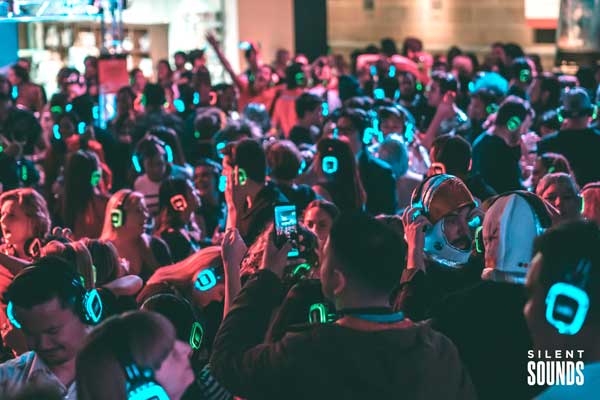 A crowd dancing at Silent Sounds silent disco