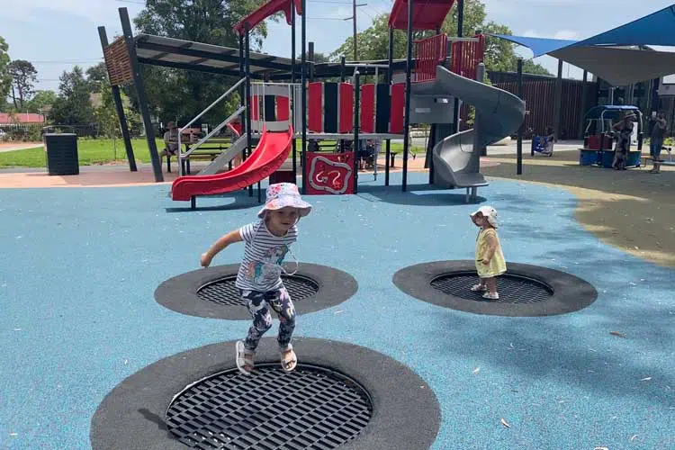 In ground trampoline playground Storey Park