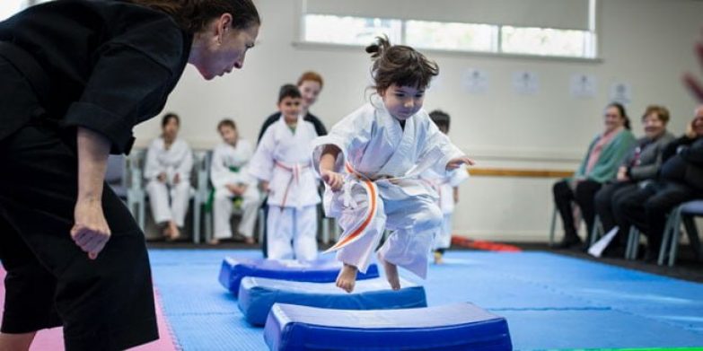 Young girl at martial arts class